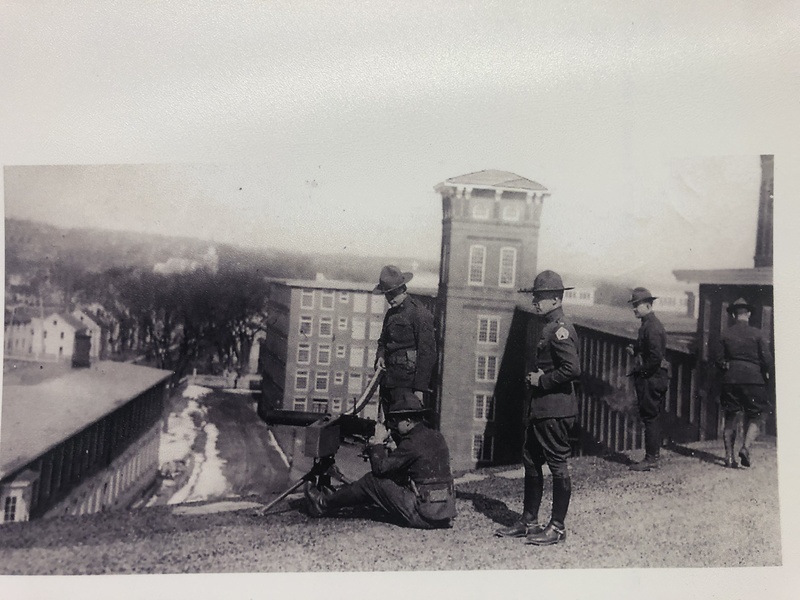Machine gun mounted to the roof of Natick Mills circa 1922
